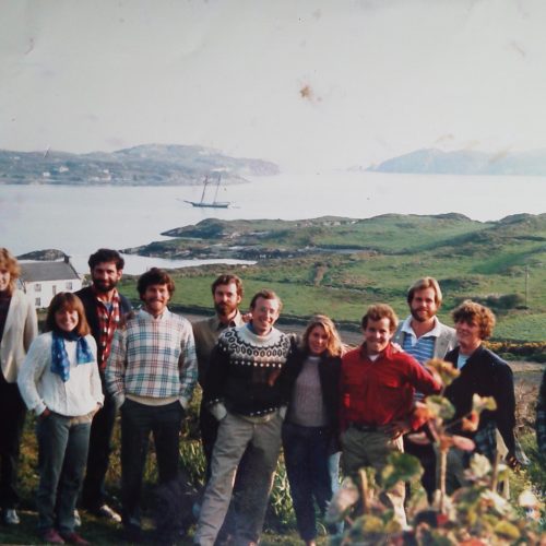 Members of the Pride of Baltimore crew take a moment for a photo with the ship in the background. L-R: Jean Zimmerman, Jennifer Lamb Bolster, Al Nejmeh, Chris Rowsom, Mark Welling, Shane Jackson, Ellen Huebsch Anderson, Joe McGeady, Jan Miles, Dan Parrott, Jeff Simmons.