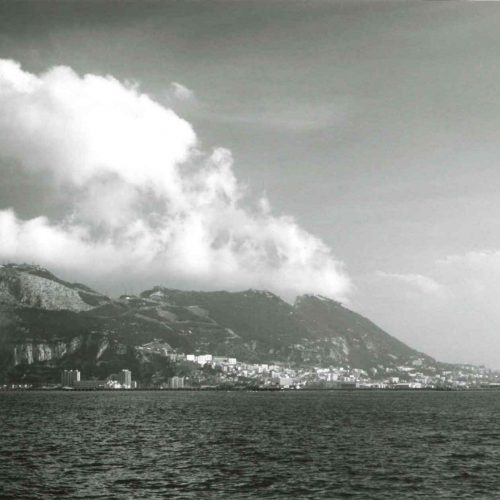 Pride sailing past the Rock of Gibraltar, October 31, 1985. Copyright Greg Pease.
