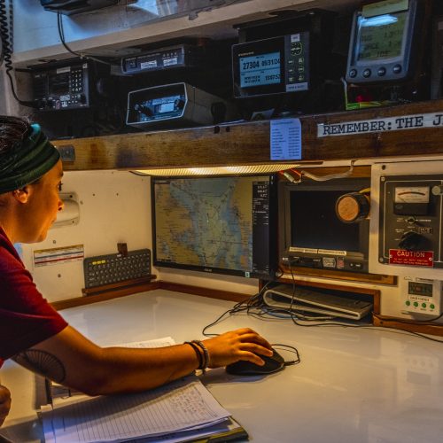 "Remember the Jar of Pennies" is printed over the navigation station in Pride II's aft cabin and serves as a reminder to our crew to our mission and who we serve. Image credit: Mark Hergan Deadrise Marine Photography